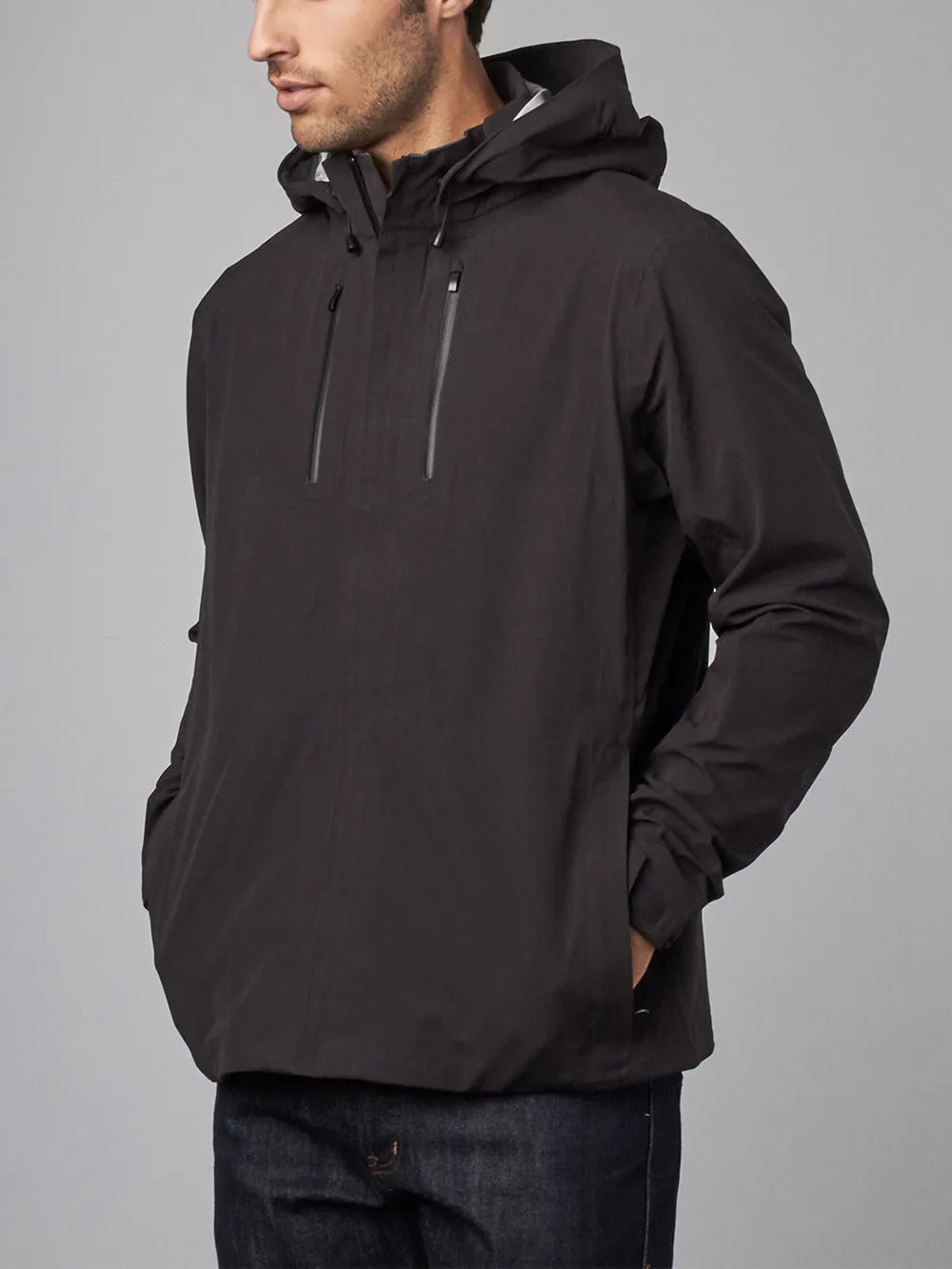 The Cubed®️ Travel Jacket: A Waterproof Shell for Everyday