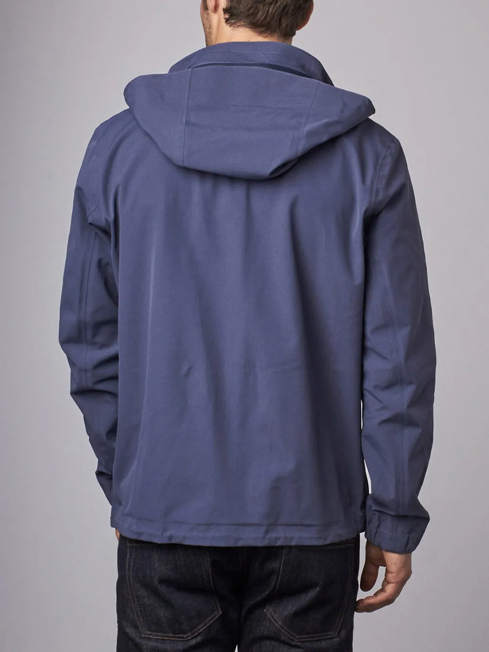 The Cubed®️ Travel Jacket: A Waterproof Shell for Everyday