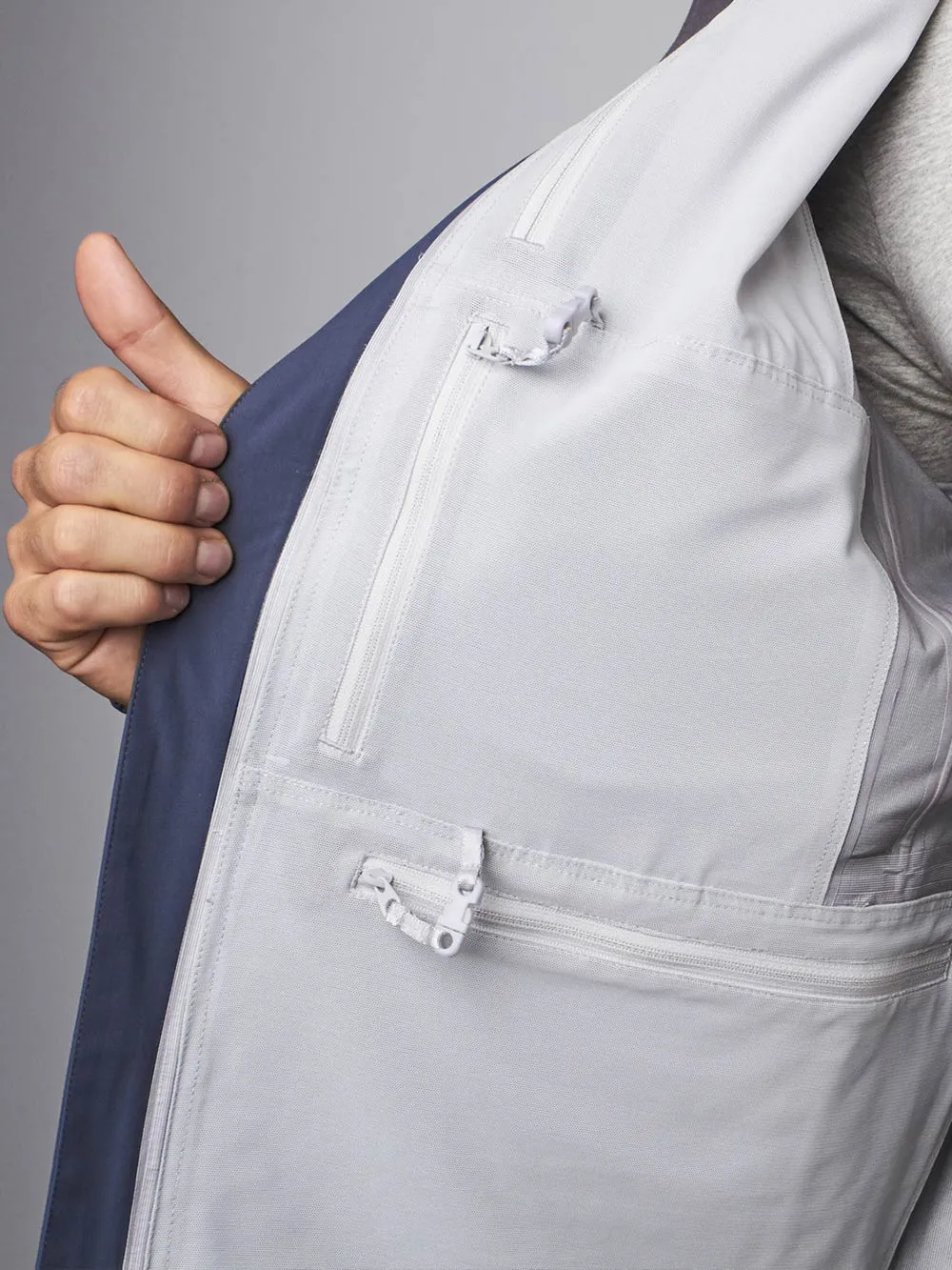 The Cubed®️ Travel Jacket: A Waterproof Shell for Everyday