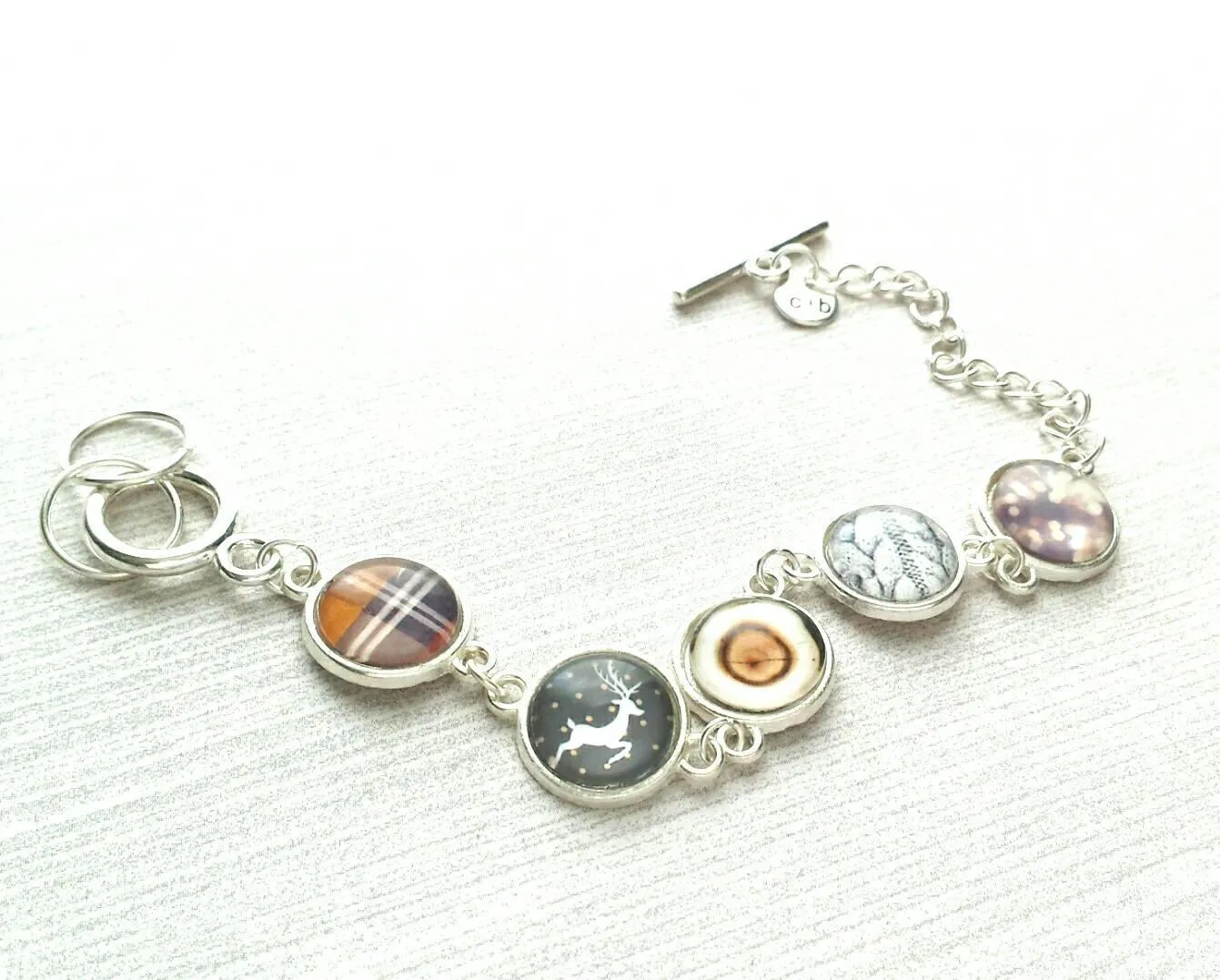 Winter Charm Bracelet, silver toggle clasp bracelet, sweater charm, wood charm, plaid charm, deer charm, silver charm bracelet, grey brown